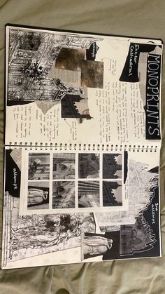 an open notebook with black and white photos on the pages, sitting on a bed