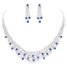 Stunning scalloped tier design of square clear and blue round crystal rhinestones create a bold look  Necklace length 14"-17" with the 3" adjustable extension chain, Decor cascade 1" length  Hypoallergenic surgical steel post back, drop earrings, 1.25" length by 0.37" width  Elegant bib necklace and earrings set is perfect for a wedding, prom or any special occasion formal event  Each item is packaged in a lovely gift box with a non tarnish jewelers fiber pad. To extend the life of your jewelry Wedding Dress Code, Extra Long Earrings, Studded Collar, Rhinestone Jewelry Set, Statement Collar, Chain Decor, Statement Collar Necklace, Trendy Bracelets, Earring Sets