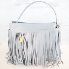 Are feeling the fringe? Theres nothing like a fringe statement handbag to bring a cute outfit together! This bag is a soft vegan leather with gold hardware and 3 zipper compartments. Each of these handbags can easily convert from a handbag to a crossbody bag with just a swap of a strap! Free shipping & Free gift included with purchase! Trendy Fringe Bags For Shopping, Chic Fringe Crossbody Shoulder Bag, Chic Rectangular Shoulder Bag With Tassels, Chic Fringe Hobo Bag For Travel, Chic Travel Hobo Bag With Fringe, Chic Fringe Top Handle Shoulder Bag, Elegant Fringe Bags For Daily Use, Elegant Fringe Travel Bag, Elegant Travel Bags With Fringe