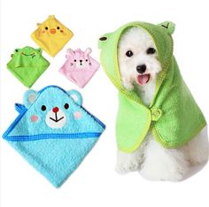 a white dog wearing a green hoodie with four different animal designs on it