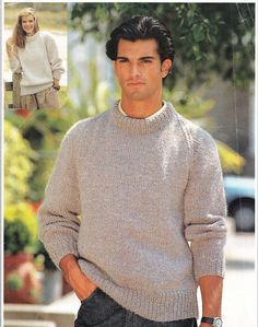 a man is wearing a sweater and pants in the catalog for men's clothing