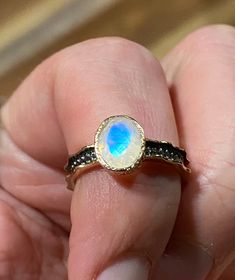 Elegant, vintage, handcrafted, genuine rainbow moonstone rings, 18k gold plated 925 sterling silver. Surface size: 9*7 mm. Band width: 3 mm. Stone weight: 1 grams. Sizes: 6, 7, & 8. Gold Ethiopian Opal Heirloom Rings, Heirloom Ethiopian Opal Gold Rings, Unique Yellow Gold Moonstone Ring, Yellow Gold Moonstone Ring With Ethiopian Opal, Heirloom Style Handmade Gold Moonstone Ring, Handmade Heirloom Gold Moonstone Ring, Heirloom Handmade Gold Moonstone Ring, Yellow Gold Moonstone Ring With Ethiopian Opal For Gift, Ethiopian Opal Moonstone Ring In Yellow Gold For Gift