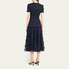 Oscar de la Renta tweed dress featuring floral guipure pleated skirt, eyelash fringed edges, and a self-belt Round neckline Short sleeves A-line silhouette Hem falls below the knee Invisible back zip Virgin wool/elastane Dry clean Made in Italy Formal Knee-length Tweed Dress With Button Closure, Luxury Midi-length Dress With Gathered Skirt, Luxury Spring Midi-length Tweed Dress, Luxury A-line Tweed Dress, Knee-length Tweed Dress With Button Closure, Wardrobe Sale, Evening Flats, Cocktail Jacket, Skirt Midi