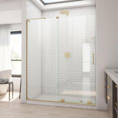 a bathroom with a glass shower door and white tile walls, along with a chair