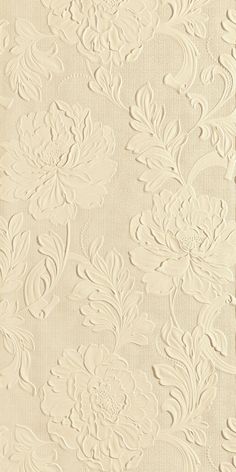 an image of a white wallpaper with floral designs on it's side and the bottom