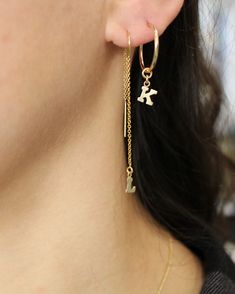 "Get personal with this letter threader earring in 14 carat gold filled or sterling silver. Get one or Buy 2 of the same, or, add 2 different initials to your basket to create a unique look. Choose your kids initials, your loved ones or go for O and X for hugs and kisses. So comfy you never need take them off Layer up with our matching initial hoops L E T S . T A L K . E A R R I N G S ✤ Available in 14k gold filled and Sterling Silver ✤ Available in one size - From the ear lobe it hangs approx 3 Personalized Yellow Gold Earrings For Everyday Wear, Gold Dangle Jewelry With Initials, Personalized Everyday Hoop Jewelry, Everyday Hoop Jewelry With Dangling Charms, Dainty Hoop Jewelry With Dangling Charms, Personalized Small Hoop Gold Jewelry, 14k Gold Hoop Earrings With Dangling Charms As Gift, Minimalist Hoop Earrings With Dangling Charms For Gift, Dainty Hoop Earrings With Dangling Charms As Gift