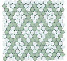 a white and green mosaic tile with circles on the back ground, all in different sizes