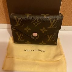 Authentic Louis Vuitton Monogram Victorine Wallet In Excellent Condition Clean Inside And Out With Coin Purse On The Side Functional And Beautiful Wallet In Rose Color Key Holder Wallet, Louis Vuitton Felicie, Louis Vuitton Sarah Wallet, Bags Louis Vuitton, Canvas Wallet, Louis Vuitton Wallet, Waist Bags, Trifold Wallet, Louis Vuitton Bags