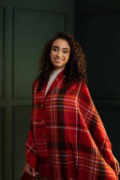 Add a splash of quirky eloquence to your overall look with this Dana Plaid poncho! Old-school-inspired plaid patterns look no less than a spectral delight to snuggle your style in as you step out that door. The hem's tassel work exemplifies its exquisite craftsmanship. Plaid Button Poncho Navy or Red Fall Plaid Shawl Scarf, Plaid Shawl Scarf For Fall, Oversized Red Cape For Fall, Fall Red Shawl Cape, Red Shawl Cape For Fall, Plaid Scarves For Fall, Casual Red Cape For Autumn, Casual Red Cape For Fall, Red Shawl Scarves For Fall