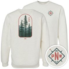 a white sweatshirt with trees on it and the words pnw printed in red