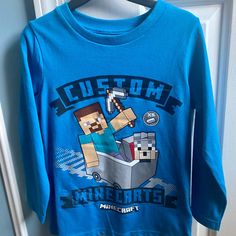 Brand New Long Sleeve Minecraft Shirt. No Marks Or Tears. Blue Long Sleeve Shirt For Playtime, Playful Long Sleeve Blue T-shirt, Fun Blue Long Sleeve T-shirt, Minecraft Shirt, Minecraft Shirts, Animal Graphic Tee, Long Sleeve Tee Shirts, Boys Long Sleeve, Marks And Spencer