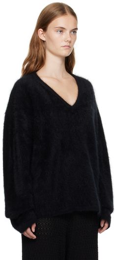 450 g brushed knit organic cashmere sweater. · Rib knit V-neck, hem, and cuffs · Dropped shoulders Supplier color: Black brushed Black Cashmere V-neck Sweater For Winter, Black Cashmere V-neck Casual Sweater, Black Cashmere Casual V-neck Sweater, Cozy Black Cashmere Sweater, Black Ribbed Cuff V-neck Sweater For Fall, Black Fine Knit V-neck Sweater For Fall, Black V-neck Sweater For Loungewear, Lisa Yang, Cashmere Sweater