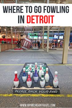 there is a sign that says, where to go bowling in detroit please back your pins