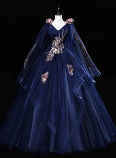 Experience a night of enchantment in this exquisite Navy Blue Tulle V-neck Sequins Embroidery Quinceanera Dress. This elegant ball gown showcases a dazzling v-neckline with delicate sequin embroidery that accents the bodice and flows down to the full skirt. The sequin embroidery is complemented with a tulle fabric and a lovely navy blue hue Magnificent Dresses, Blue Starry Sky, Design Gown, Blue Princess Dress, Quinceanera Themes Dresses, Wedding Evening Gown, Quinceñera Dresses, Purple Wedding Dress, Elegant Ball Gowns