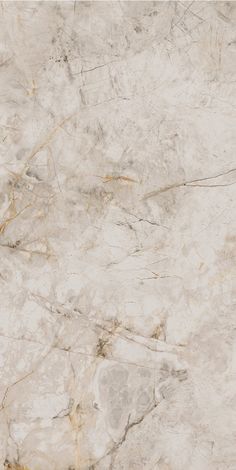 a white marble textured surface with gold veining on the top and bottom part