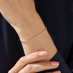 This delicate, handcrafted piece, designed for women, combines minimalist aesthetics with timeless charm. Crafted from real solid gold, it's a symbol of quality and durability. The Cuban links add a unique twist to the classic design, making it perfect for both day and night. Lightweight and flexible, it's ideal for layering with other Norm Jewels pieces.  Cherish not just a bracelet, but a handmade work of art with a story of quality craftsmanship and minimalist design. Bracelet Chain Details ❥ Gold KT: 14k Solid  Gold ❥ Chain Width: 2.90 mm ❥ Chain Thickness: 1.20 mm ❥ Gold Color Options: Yellow Gold, White Gold ❥ Ready to Ship in 4-7 Business Days MORE FROM US More Bracelets: https://etsy.me/3nc1GYi More about my shop: https://etsy.me/3mwMnsA ESSENTIAL INFORMATION 💎 BRENNMORE pieces ar Minimalist Bangle Bracelet With Delicate Chain, Minimalist Chain Bracelet With Adjustable Bangle, Minimalist Bangle Chain Bracelet With Adjustable Chain, Minimalist Formal Bracelet With Simple Design, Minimalist Adjustable Chain Bangle Bracelet, Minimalist Delicate Chain Bangle Bracelet, Minimalist Everyday Jewelry With Bracelet Strap, Everyday Minimalist Jewelry With Bracelet Strap, Simple Gold Bracelet With Adjustable Chain