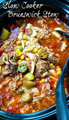 slow cooker brunch stew in a crock pot with spoons on the side