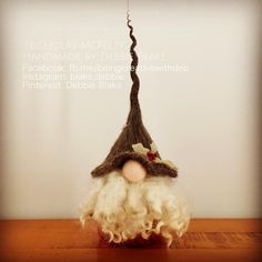 a close up of a gnome's head on top of a table with text above it