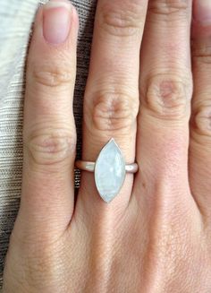 Silver Marquise Moonstone Ring, Marquise White Sterling Silver Ring, Marquise Sterling Silver Ring In White, Minimalist Marquise Silver Rings, Silver Marquise Minimalist Rings, Minimalist Silver Marquise Ring, White Marquise Cut Gemstone Jewelry, Modern White Marquise Cut Jewelry, Modern White Marquise Jewelry