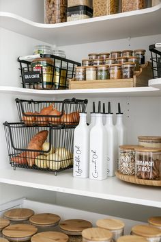 an organized pantry with bread, milk and other items