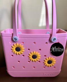 Hey Besties!  Welcome to our shop, we hope you enjoy💎🦋 ITEMS INCLUDED: * jumbo sunflower bag charm/ Jibbit  CARE: Avoid water and oils to prolong longevity  -wipe with dry cloth after use  -store somewhere dry and safe after use  All items are brand new.  Items used in photos are for personal use ONLY‼️ BELLY RING WARNING‼️‼️: PLEASE be careful when sleeping/ pant bottoms with the dangle jewelry, they will get caught & snag. We are not responsible for any misuse or medical damages.  LEGAL DISCLAIMER: We DO NOT claim any ownership or rights to any designs, images, characters, brands, logos or people / persons used. All designs are INSPIRED. All images / graphics, trademarks and designs belong to their rightful respected owners.  Check out our other listings! https://www.etsy.com/shop/XCLU Sunflower Bag, Turtle Creek, Bag Charms, Belly Ring, Beach Bags, Boutique Accessories, Shoe Charms, Belly Rings, Beach Bag