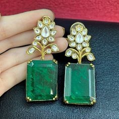 Sabyasachi Inspired Emerald Polki Earrings. These uncut Polki jewelry pieces feature mesmerizing green Kundan stones, exuding timeless elegance. Encrusted with shimmering Moissanite accents, they offer a touch of luxury and sophistication. Crafted to perfection, these Polki diamond earrings effortlessly elevate any ensemble with their regal allure. Illuminate your look with the enchanting sparkle of these exquisite uncut diamond earrings, inspired by the legendary craftsmanship of Sabyasachi. *? Traditional Emerald Earrings For Festive Season, Traditional Festive Emerald Earrings, Festive Emerald Earrings, Green Kundan Earrings For Formal Occasions, Traditional Emerald Earrings For Party, Emerald Earrings For Wedding And Festivals, Elegant Festive Emerald Earrings, Emerald Chandbali Earrings For Wedding, Traditional Emerald Drop Earrings