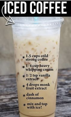 iced coffee recipe in a plastic cup on a wooden table with text overlay that says iced coffee