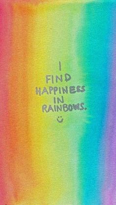 the words i find happiness in rainbows are written on a piece of colored paper