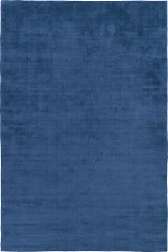 a blue rug with a white border