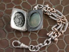 "WE SELL THIS NICE VICTORIAN PHOTO LOCKET PENDANT AND FOB CHAIN WITH LOBSTER MADE IN STERLING SILVER WITH SOME GOLD OVER ,IN VERY GOOD CONDITION ,HAS SOME SIGNS OF WEAR COMMENSURATE WITH AGE AND USE , PLEASE SEE PICTURES, MAYBE NEEDS SOME CLEANNING, PLEASE SEE PICTURES, OPEN AND CLOSE WELL, the measures are 6\" LONG total LOCKET 1\" X 3/4\" TOTAL WEIGHT 20.2gr As is a vintage antique item , it's unique , for that if you like to wear it , don't miss the opportunity, we gladly offer MICRO-PAYMENTS Victorian Photos, Pendant With Chain, Photo Locket, Chatelaine, Silver And Gold, Antique Items, Key Chain, Locket, Vintage Antiques