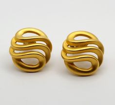 "Signed Givenchy Paris New York Open Swirl Clip On Earrings ~ Rare Design Vintage Givenchy 1\" Round Earrings with an Open Wave Design Brushed Gold Tone Satin Finish ~ Beautiful and unique! From an estate - exact age unknown; Good vintage condition; some light scratches and wear present but minimal; may need cleaning; see photos for details Many of my items for sale are treasures from the past and may reflect both history and age. Please ENLARGE photos for detailed condition of each item. Email any questions you have prior to purchase and Thank you for looking!" Vintage Givenchy Jewelry, Vintage Givenchy, Givenchy Paris, New Paris, Wave Design, Round Earrings, Vintage Earrings, See Photo, Givenchy