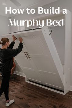 a woman moving a bed with the words how to build a murphy bed