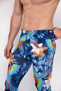 Description: Blue Jungle Print Men's Leggings Breathable & Moisture Wicking 4-Way Stretch Fabric Machine Wash Cold, Quick Drying High Stretch Nylon / Spandex Bolt Logo Patch This design does not have pockets Model is 6’2’’ (189cm) tall, 34’’ (86cm) waist and wears size Large. Stretch Blue Pants With Built-in Shorts, Blue Moisture-wicking Activewear For Surfing, Moisture-wicking Blue Activewear For Surfing, Blue Stretch Swim Trunks In Athleisure Style, Stretch Blue Bottoms For Surfing, Blue Stretch Athleisure Swim Trunks, Blue Athleisure Swim Trunks With 4-way Stretch, Blue Stretch Swim Trunks For Sports, Blue Compression Elastane Bottoms