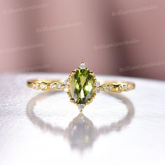 Dianty Peridot Engagement Ring Set,Silver Yellow Gold,Vintage August Birthstone Ring,Art Moissanite Wedding Ring,Micro Pave Stack Ring Gift -------------------------------------------------------------------------------------------------------------------------- The August birthstone, peridot, symbolizes strength. August is a lucky month, as it has not one, but three beautiful birthstones. If you're born in August or are shopping for an August birthstone, you'll have three gemstones to choose fr Anniversary Peridot Diamond Ring, May Birthstone Solitaire Crystal Wedding Ring, Peridot Diamond Wedding Ring, Fine Jewelry Peridot Diamond Ring For Wedding, Peridot Birthstone Ring With Center Stone For Wedding, Peridot Birthstone Ring For Wedding, Wedding Jewelry With Peridot In Halo Setting, Green Solitaire Crystal Wedding Ring, Elegant Peridot Birthstone Ring For Wedding