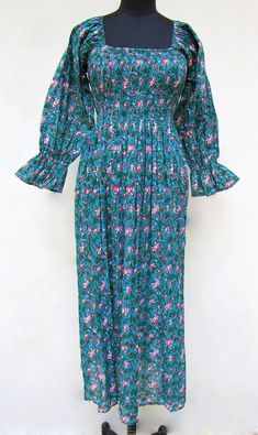 ITEM DESCRIPTION summer blue floral printed women's maxi dress - square neckline with smocked Indian dress - long ruffle sleeve bohemian maxi  Features: Long sleeve, square neck, Long dress Fabric : 100% Cotton cambric hand block printed fabrics  Sleeve Length = 22 inch For more sizes & their measurement, please refer our below chart to understand the sizes variations available with us For your size requirement, please mention your size in seller note at the time of buying. IMPORTANT NOTE: - SIZE MEASUREMENT AND CHARTS ARE OF THE ACTUAL GARMENT AND OF THE PERSON WEARING THE GARMENT. BUST MEASUREMENT IS PROVIDED IN INCH ALL AROUND FROM ARMPIT TO ARMPIT OF THE GARMENT. SIZE MEASUREMENT  BUSTLENGTHSHOULDER XXS34 inch51 inch13.5 inch XS36 inch51 inch14 inch S38 inch51 inch14.5 inch M40 inch51 Square Neck Long Dress, Long Summer Dresses Maxi, Indian Look, Tie Maxi Dress, Bohemian Maxi, Bohemian Maxi Dress, Indian Dress, Block Printing Fabric, Summer Blue