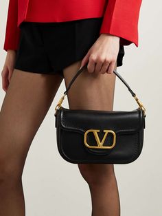 VALENTINO GARAVANI VLOGO embellished textured-leather shoulder bag | NET-A-PORTER Classic Evening Bags With Logo, Elegant Rectangular Shoulder Bag With Logo, Classic Formal Shoulder Bag With Logo, Classic Gold Shoulder Bag With Logo, Formal Shoulder Bag With Logo, Formal Logo Satchel Shoulder Bag, Gold Leather Bag With Logo, Luxury Rectangular Shoulder Bag With Logo, Classic Evening Shoulder Bag With Logo Hardware