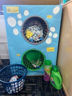 there is a laundry basket next to the washer and other items on the floor