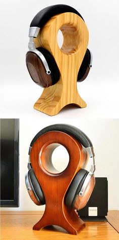 two wooden headphones stand next to each other