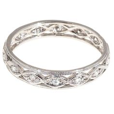 Original wide Platinum Eternity ring with diamond all around. Delicate bead work. 14 round single cut diamonds, approx. total weight .20cts, F, VS Platinum 3.4 grams Stamped: 980 Width: 4.2mm Height: 1.5mm Size 9 and sizeable Platinum Eternity Band With Pave Setting, Dazzling Round Platinum Eternity Band, Classic Rings With Decorative Band In Diamond White, Classic Diamond White Ring With Decorative Band, Classic Diamond White Rings With Decorative Band, Round Diamond Jewelry With Decorative Band, Diamond Jewelry With Decorative Round Band, White Gold Ring With Decorative Band, Round Diamond Bands With Brilliant Cut