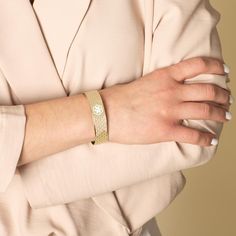 Our Golden Mae Medical ID Cuff is durable, yet has a delicate look with its pearlescent inlay over a gold tone finish. This adjustable, hypoallergenic women's medic alert cuff features extra elements of added safety without sacrificing style.

Two medical caduceus symbols: one on each side
The words, �Med Info Here� inscribed on one cuff end
The internationally recognized medical caduceus symbol is designed to alert Emergency Medical Personnel to your medical information, discreetly custom engra Medical Caduceus, Caduceus Symbol, Engraved Cuff, Medical Id Bracelets, Medical Bracelet, Id Bracelets, Bag Icon, Medical Information, Cross Design