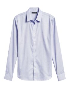 No need to iron, this soft, 100% cotton dress shirt is specially engineered to resist wrinkles so it stays looking crisp and pulled-together.  Spread collar.  Clean front.  Adjustable double-button barrel cuffs.  French placket for a clean look.  Interlined collar for a crisp finish.  Triangular gusset at side seams for durability.  Shirttail hem.  Slim fit.  Untucked: Hits at the high hip.  Runs 1" shorter through the body for an untucked look that still looks sharp.  Center back length (size M Slim Fit Dress Shirts, Cotton Dress, Cotton Dresses, Stitch Fix, Dress Shirt, Wrinkles, Banana Republic, Barrel, Slim Fit