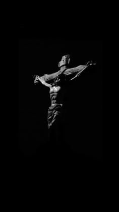 a black and white photo of the crucifix