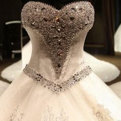 a wedding dress on display in a store