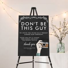 a sign that says, don't be this guy we invent you to be fully present during our ceremony