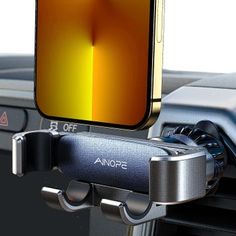 an image of a cell phone holder attached to a car's dash camera mount