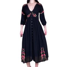 Free People Black Button Up Midi Dress With Floral Embroidery Details. Has Very Witch / Stevie Nicks Vibes. I’m 5’5” For Reference. Only Worn A Few Times. Had One Small Pin Hole But No Other Major Signs Of Wear. The Embroidery Is So So Gorgeous. Retailed For $250+ Free Shipping!! Measurements Flat: -Chest: 16” -Waist: 13” -Hip: Loose -Length: 49 #Free People #Bogo #Maxi Black Embroidered Maxi Dress For Spring, Bohemian Black Maxi Dress With Floral Embroidery, Black Bohemian Dress With Buttons, Spring Black Embroidered Midi Dress, Black V-neck Midi Dress With Floral Embroidery, Black Embroidered Midi Dress For Spring, Bohemian Spring Dress With Button Closure, Pink Bohemian Dress With Buttons, Bohemian Dress With Button Closure For Spring