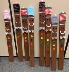 four wooden skis decorated with christmas decorations