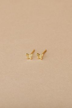 Mariposa is our tiny gold vermeil butterfly stud, the only thing better than flowers is butterflies. We love to wear our Mariposa solo or layer with a hoop. - 3D gold vermeil butterfly stud detail with butterfly closure - .5mm width, 4mm length, 1mm thick - nickel free - hypoallergenic 14k Gold Butterfly Earrings With Butterfly Charm, 14k Gold Butterfly Charm Earrings, 14k Gold Butterfly Earrings With Charm, Dainty Gold Butterfly Jewelry, Dainty Yellow Gold Butterfly Earrings, Hypoallergenic Yellow Gold Butterfly Jewelry, Hypoallergenic Butterfly-shaped Yellow Gold Jewelry, Hypoallergenic Butterfly Yellow Gold Jewelry, Minimalist Gold Earrings With Butterfly Charm