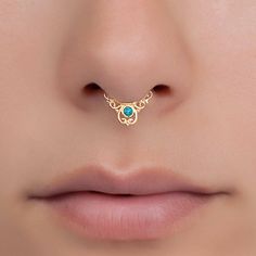 Unique and beautiful septum ring for non pierced nose. Tribal, ethnic, delicate design Material: You can choose the material : Gold plated brass / Sterling Silver / Brass Measures: Thickness: 1 mm - 18 gauge Width - 11 mm - 0.43Inch Length - 12.5 mm - 0.5Inch Diameter:0.23 Inch - 6mm ( The size can be adjusted according to your nose because it's a clip-on) *Nickel-free *Also available in a version for pierced nose. > How to clean brass and silver? Brass and silver oxidize naturally with time Bohemian Adjustable Septum Ring As Gift, Bohemian Gold Nose Rings Nickel Free, Gold Bohemian Nickel-free Nose Ring, Bohemian Gold Nickel-free Nose Ring, Gold Bohemian Nickel-free Septum Ring, Bohemian Hypoallergenic Nose Rings As Gift, Bohemian Adjustable Septum Ring Gift, Bohemian Gold Nose Rings For Festival, Bohemian Hypoallergenic Septum Ring As Gift