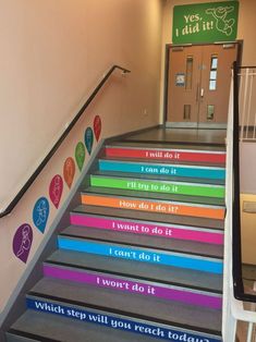 the stairs are painted with different colors and designs on them, along with words that read i will do it